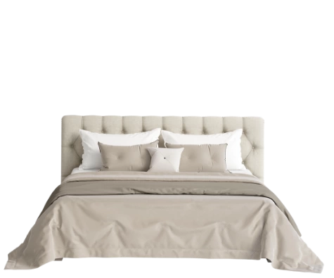 Ein ordentlich gemachtes Bett mit beigem Bettzeug, weißen Kissen und einem getufteten Kopfteil.